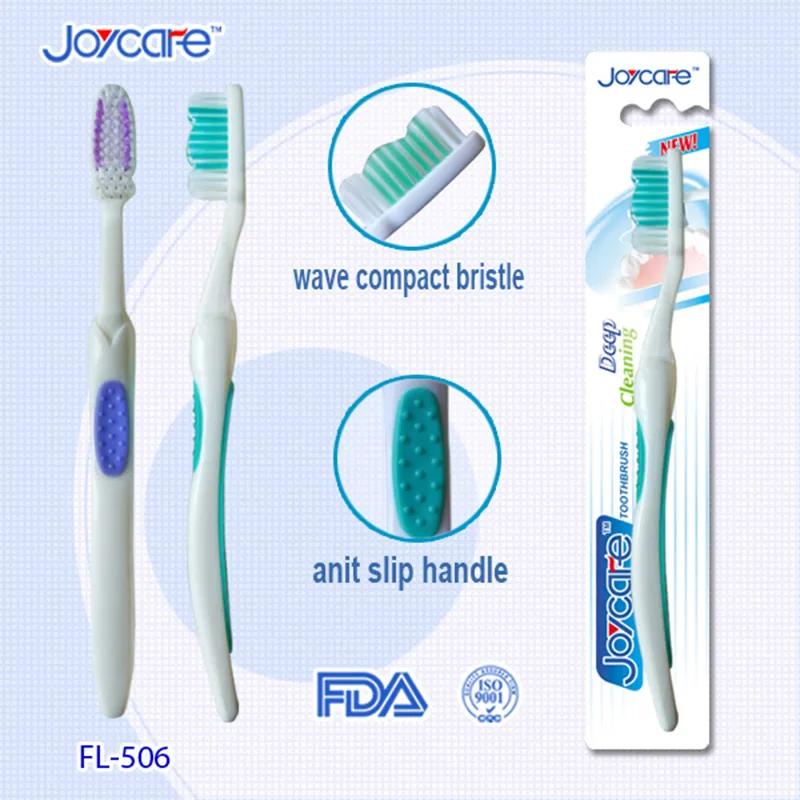 Health Care Adult′s Toothbrush/Nylon Wave Bristles/Antislip Soft Rubber Handle